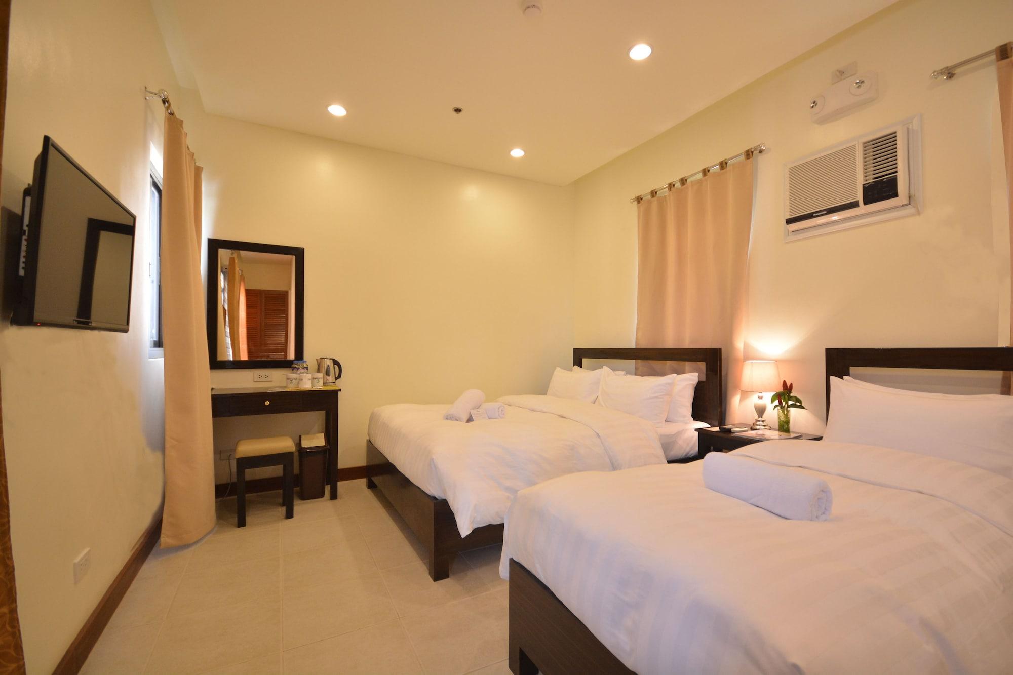 เซาท์วินด์ ปาลาวัน Hotel Puerto Princesa ภายนอก รูปภาพ