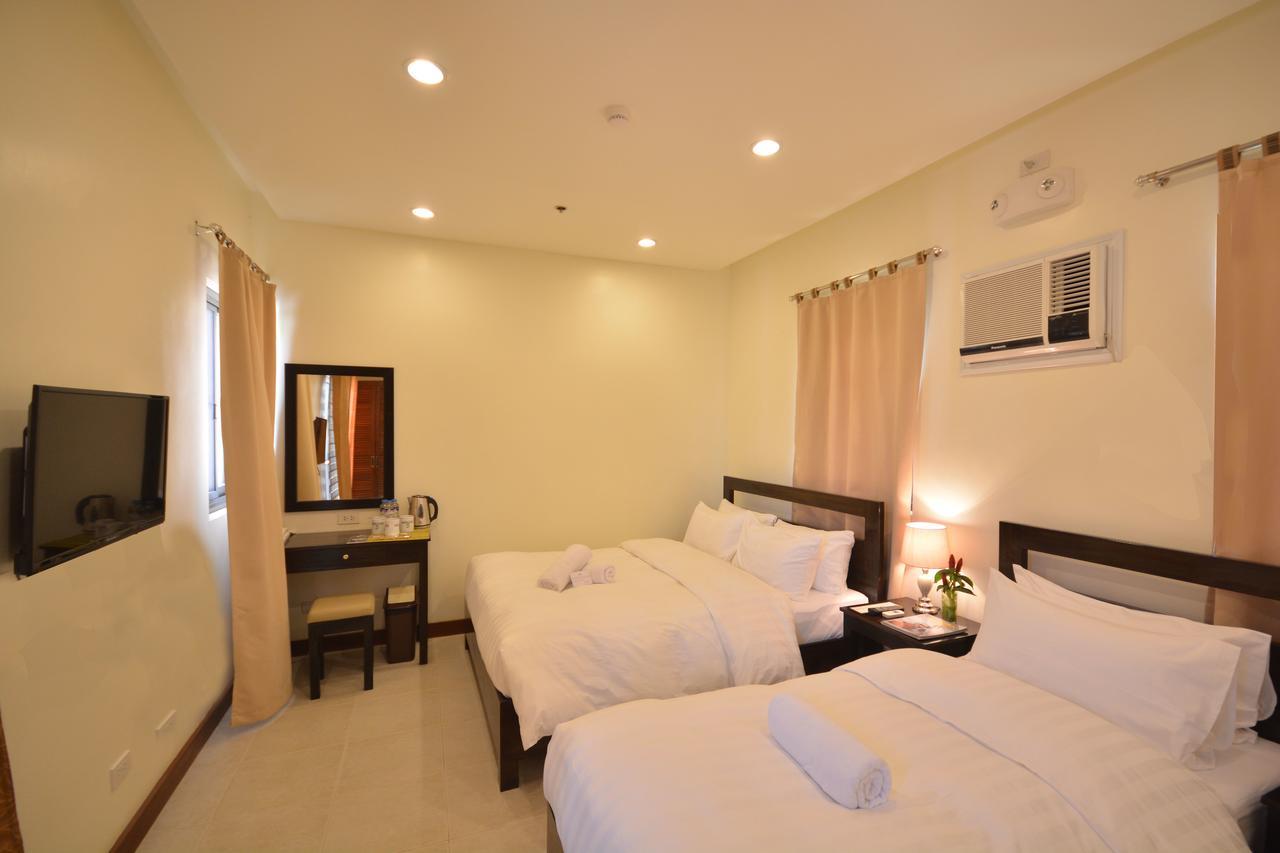 เซาท์วินด์ ปาลาวัน Hotel Puerto Princesa ภายนอก รูปภาพ